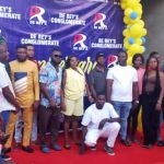 JBB and wife flanked by staff